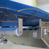 Troughed rod bed conveyor system